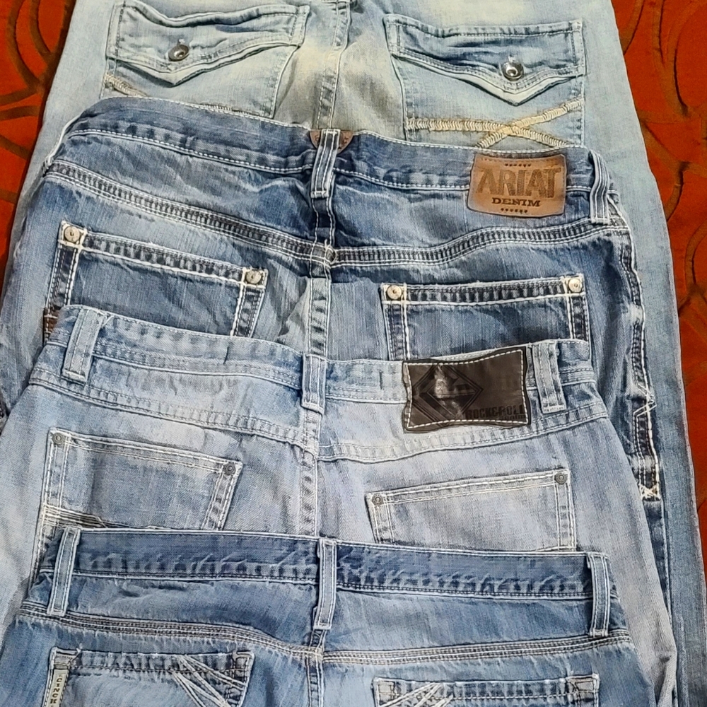 Cinch, Ariat, TKAxel, and Rock and Roll Jeans